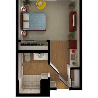 A studio apartment floor plan featuring a bedroom, bathroom, and kitchen area.