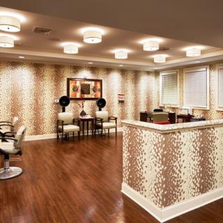 A modern reception area with stylish decor and comfortable seating.