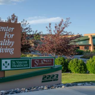 The Center for Healthy Living signage at a healthcare facility showcasing various services.
