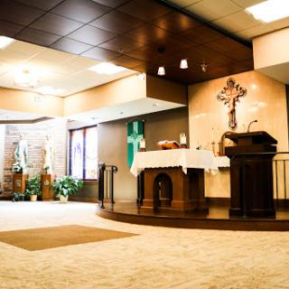 A serene view of the altar in a modern church setting.