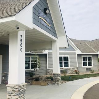 A modern commercial building with a welcoming entrance.