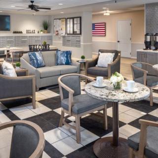 A modern lounge area with comfortable seating and stylish decor.