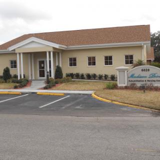 A medical office building with a welcoming entrance and well-maintained landscaping.