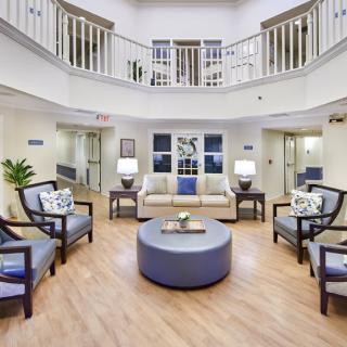 A spacious and modern lobby with comfortable seating and elegant decor.