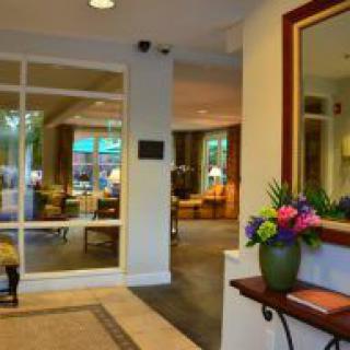 A cozy lobby area with comfortable seating and elegant decor.