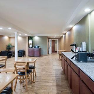 A cozy dining area with wooden furniture, providing a warm atmosphere.