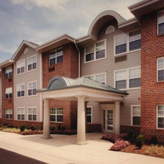 A modern residential building with a welcoming entrance.