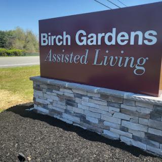 Sign for Birch Gardens Assisted Living, welcoming residents and visitors.