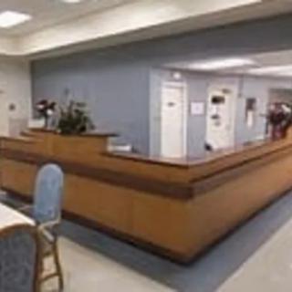 A spacious reception desk area in an office setting.