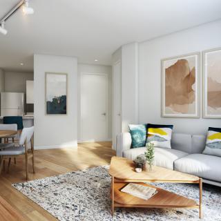 Modern living room with stylish decor and ample natural light.