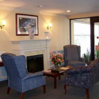 Cozy living room with a fireplace and comfortable seating.