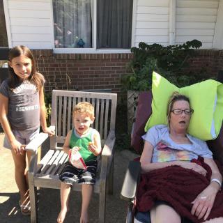 Family enjoying a sunny day outside.