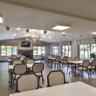 A spacious dining area with modern decor and ample seating arrangements.