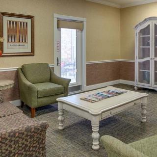 A cozy living room with comfortable seating and tasteful decor.