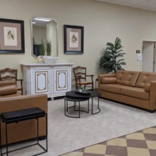 A well-furnished lobby with comfortable seating and tasteful decor.