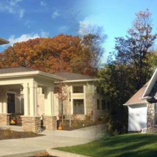 A scenic view of two residential houses surrounded by autumn foliage.
