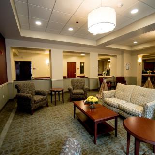 A cozy lobby area with comfortable seating and ambient lighting.