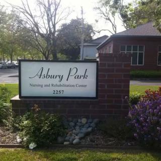 A sign for Asbury Park Nursing and Rehabilitation Center.