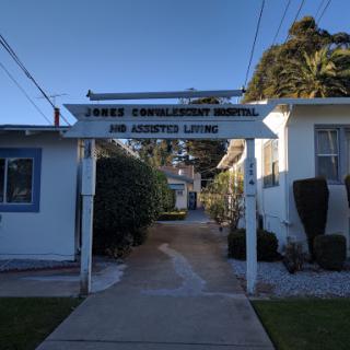 Entrance to a residential complex with clear signage.