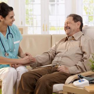 A nurse providing compassionate care and support to an elderly patient.