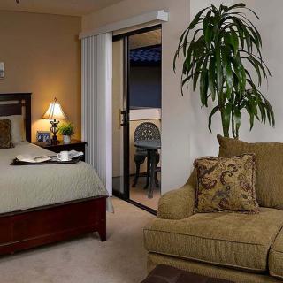 Cozy bedroom with stylish furniture and decor.