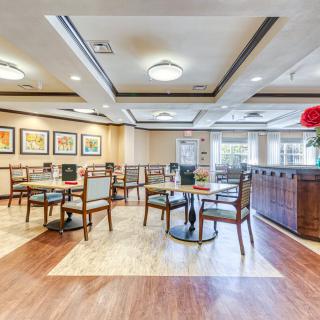 A modern restaurant dining area with stylish decor and comfortable seating.
