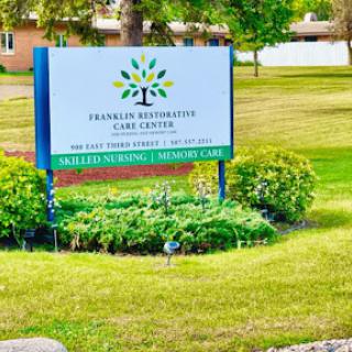 Signage for the Franklin Recreation Centre, surrounded by manicured lawns and greenery.