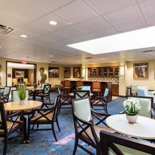 A well-lit lobby with modern seating and decor.