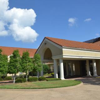 A beautiful architectural structure under a clear blue sky.