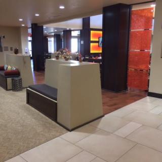 A modern hotel lobby with stylish seating and decor.