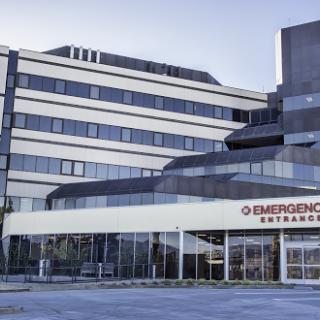 The emergency entrance of a modern hospital building.