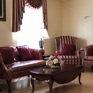 Elegant living room with classic furniture and decor.