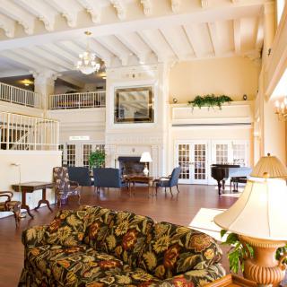 Elegant hotel lobby with comfortable seating and classic decor.
