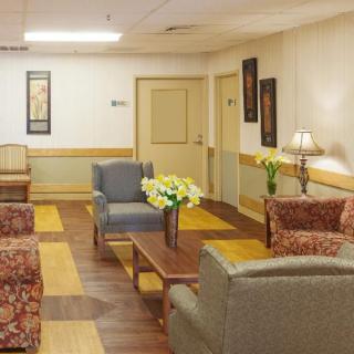 A cozy lounge area with comfortable seating and elegant decor.