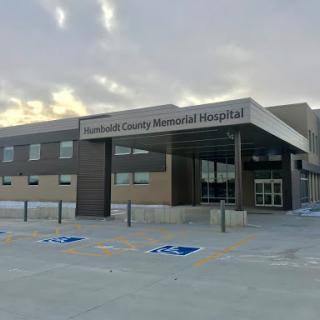 Exterior view of the Sanderson County Memorial Hospital at dusk.