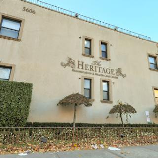 The Heritage building showcasing an elegant exterior with unique signage.