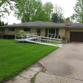 A house featuring a wheelchair ramp for enhanced accessibility.