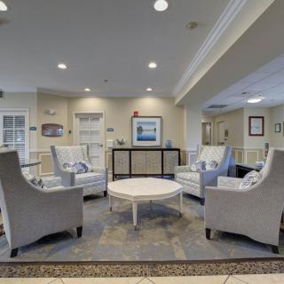 A modern living room with comfortable seating and stylish decor.