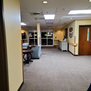A spacious and well-lit lobby area featuring comfortable seating and a welcoming atmosphere.