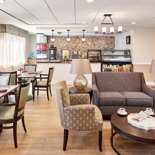 A cozy and modern lounge cafe with comfortable seating and a stylish decor.