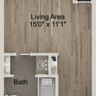 A studio apartment floor plan showcasing the living area and bathroom dimensions.