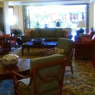 A cozy living room with comfortable seating and elegant furniture.