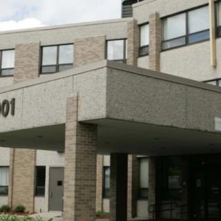 The entrance of a modern school building.
