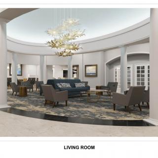 A luxurious and spacious living room with elegant furnishings.