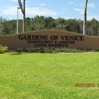 Entrance sign for Gardens of Venice, an independent and assisted living residence.