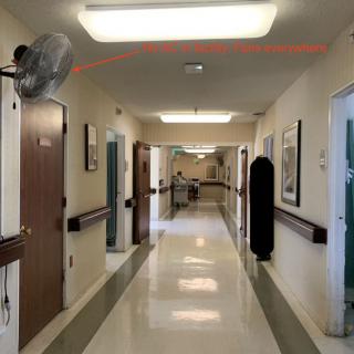 A clean and well-lit hospital corridor.