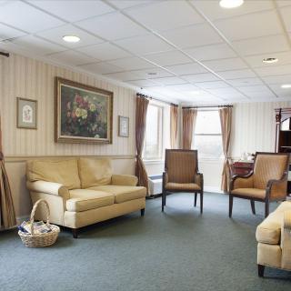 A cozy living room with comfortable seating and tasteful decor.