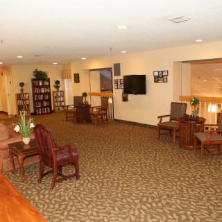 A spacious lobby with comfortable seating and modern decor.