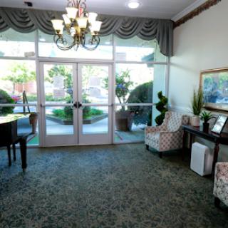 A welcoming lobby featuring elegant furnishings and natural light.