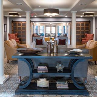 A luxurious and modern living room with comfortable seating arrangements and stylish decor.
